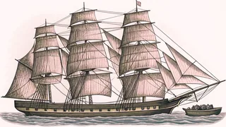 A tall sailing ship cuts through azure waters with full sails billowed and smaller boat alongside.