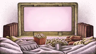 A cozy movie night setup glows with popcorn and soft blankets nearby.